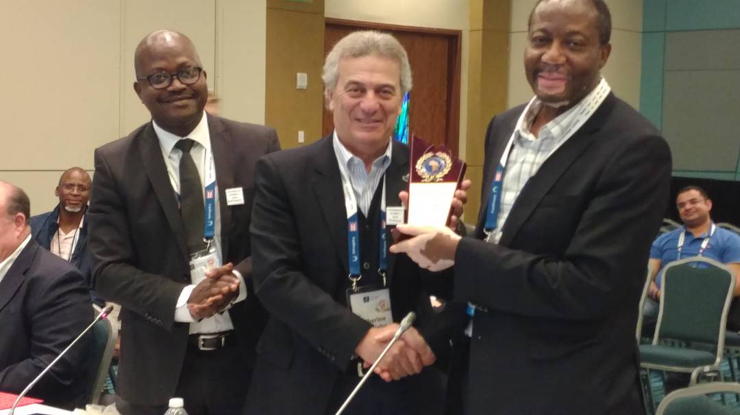 Distinguished Speaker Recognition Award Presentation to Pierre Dandjinou AfICTA